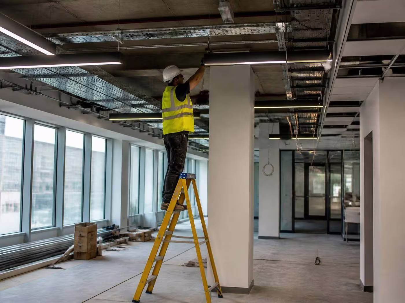 Commercial office fit out with cable tray and linear LED lighting